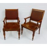 A pair of oak open armchairs with upholstered backs and solid seats, on turned front legs, 100 x