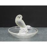 A Lalique glass pin dish with an opaque bird to centre, 7cm high