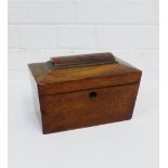 A rosewood sarcophagus shaped tea caddy, the hinged lid opening to reveal twin compartments