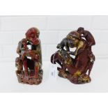 Two carved soapstone monkey figure groups, 23cm high, (2)