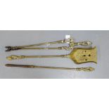 Brass fireside companion set, to include a shovel, poker and tongs, (3)