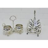 An unusual Epns toast rack on four claw feet, 25cm high, together with a Walker & Hall cream and