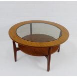 A retro Schreiber coffee table, with circular glass insert and undertier, 46 x 85cm