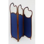 A Victorian mahogany framed three fold draught screen, one view with blue upholstered panels and