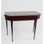 A mahogany foldover table, on tapering supports and spade feet, 76 x 97cm