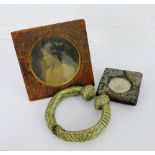 A mixed lot to include a Charles Jenner's & Co leather mounted photograph frame, together with a