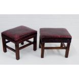 A pair of footstools, each with a red leather upholstered top, 38 x 48cm, (2)