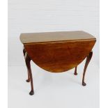 A mahogany drop leaf table, the circular top on cabriole supports and pad feet, 75 x 94cm