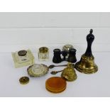 A collection of inkwells, a compass, two brass bells, sugar tongs and opera glasses, etc., (a lot)