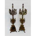 A pair of late 19th century faux bronze patinated Spelter four branch candelabra on Rococo style