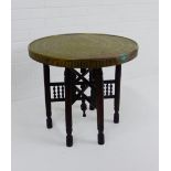 An early 20th century brass topped Benares table, 60cm diameter