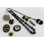 A collection of Victorian and later sardonyx striped hardstone jewellery to include beads, six