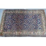 An Eastern foliate pattern rug, 220 x 134cm