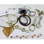 A mixed lot of costume jewellery to include necklaces, bangles and two wristwatches, etc (a lot)