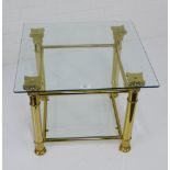 A lamp / side table, the square glass top on brass Corinthian column supports, 43 x 55cm