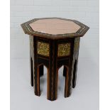 An octagonal inlaid side table, with rose tinted glass top over minaret shaped supports, 66 x 60cm