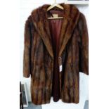 A vintage brown fur coat