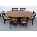 A mahogany dining suite comprising six chairs and extending dining table with extra leaf, 74 x