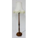 A mahogany standard lamp and shade, 180cm high