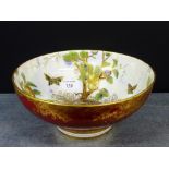 An Aynsley porcelain butterfly and fruit tree patterned lustre bowl on a plain circular foot rim (