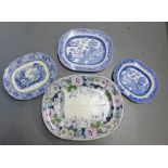 Three blue and white ashets to include two 'Willow' pattern, one 'Marseillaise' and another