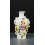 A Vienna porcelain vase with floral encrusted Deutsche Blumen pattern, 19cm high