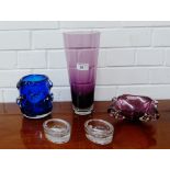 A collection of mid century art glass to include a blue vase, aubergine dish and tapering vase,