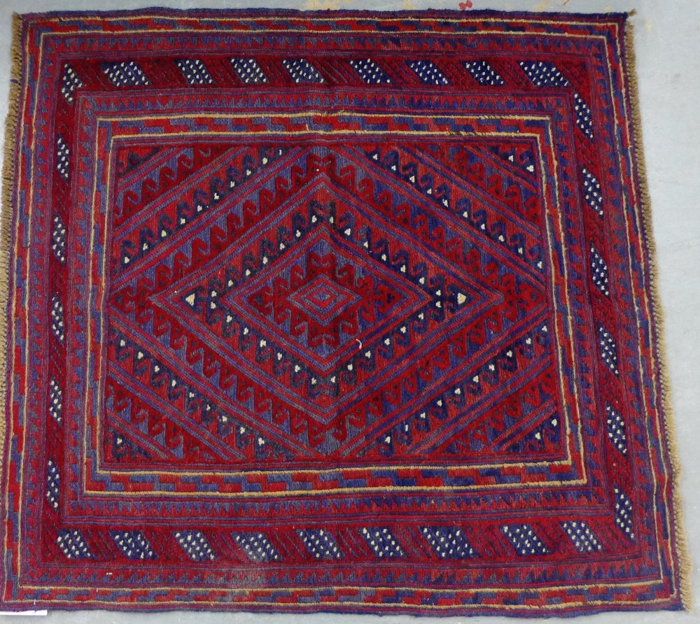 A tribal rug, 104 x 120cm