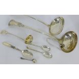 A collection of Epns flat wares to include ladles, sugar tongs and teaspoons etc., (a lot)