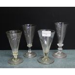 A group of four early 19th century Ale glasses, tallest 14cm high, (4)