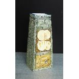 A Troika coffin vase, the green body with incised abstract pattern with painted backstamp and