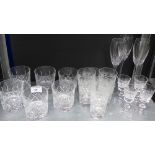 A quantity of drinking glasses to include whisky tumblers, sherry glasses, wine glasses etc., (a