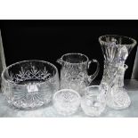 A quantity of cut crystal to include fruit bowl, vase, water jug, etc., (a lot)