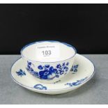 An 18th century Worcester blue and white teabowl and saucer in painted fruit pattern, (2)