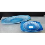 Two Carlton Ware mid century blue glazed oblong dishes with black backstamps, largest 35cm wide, (2)