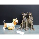 A Frith resin sculpture of two dogs, together with another of a Beagle in a sunhat, tallest,