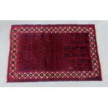 A Baluchi prayer rug with red field and overall foliate pattern, 138 x 88cm