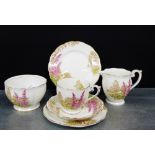 A Queen Anne 'Lovers Lane' patterned china teaset, comprising six cups, six saucers, six side