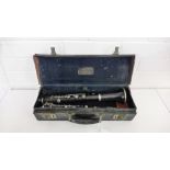 A Boosey and Hawkes Clarinet, with Serial No.32878, contained within leather Boosey and Hawkes box