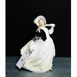 A Royal Doulton 'Autumn Breezes' porcelain figure, with HN2147 number to the base in an unusual