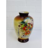 A painted opaque glass baluster vase, 29cm high