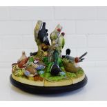 Birds of the Forrest fine porcelain figures, contained on a circular wooden base designed by Bob