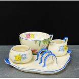 A Crown Devon 'Fielding' Art Deco breakfast set hand painted with pansies