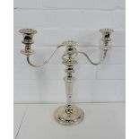 An Epns candelabra on circular footrim, 35cm high