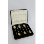 George V silver coffee bean handled spoons, in fitted case, bearing makers mark for Walker & Hall,