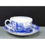 A Spode Italian blue and white oversized cup and saucer, the cup inscribed 'We'll Tak a Cup of