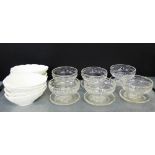 A set of eight Coalport white glazed Country Ware leaf moulded dishes, together with a set of six