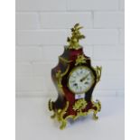 A French tortoiseshell and gilt metal mounted mantle clock, the enamel dial marked Planchon au
