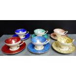 A set of six Alka Bavarian porcelain harlequin coloured coffee cups and saucers, (6)
