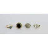 A collection of four 9 carat gold gemset dress rings (4)